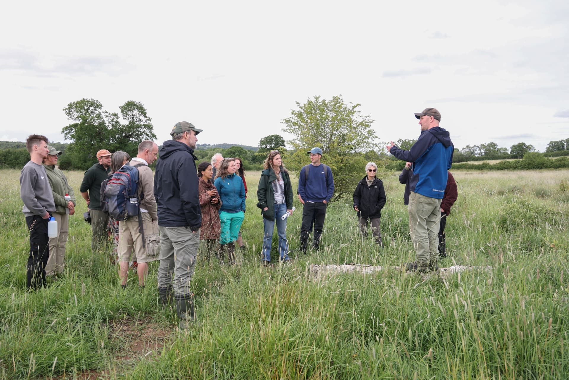 A group of visitors on a rewilding site tour